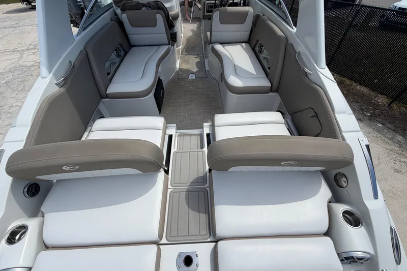 Slide: The Image of 2019 Crownline Eclipse E295 XS boat interior with spacious seating and modern design. - 20