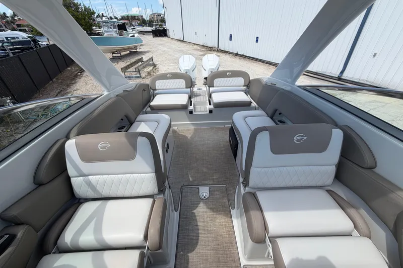 Slide: The Image of 2019 Crownline Eclipse E295 XS boat interior with luxurious seating and modern design. - 21