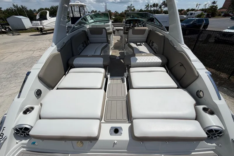Slide: The Image of 2019 Crownline Eclipse E295 XS boat interior with spacious seating and modern design. - 24