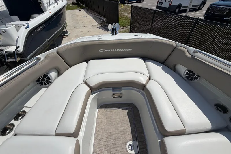 Slide: The Image of 2019 Crownline Eclipse E295 XS boat interior with spacious seating and modern design. - 28