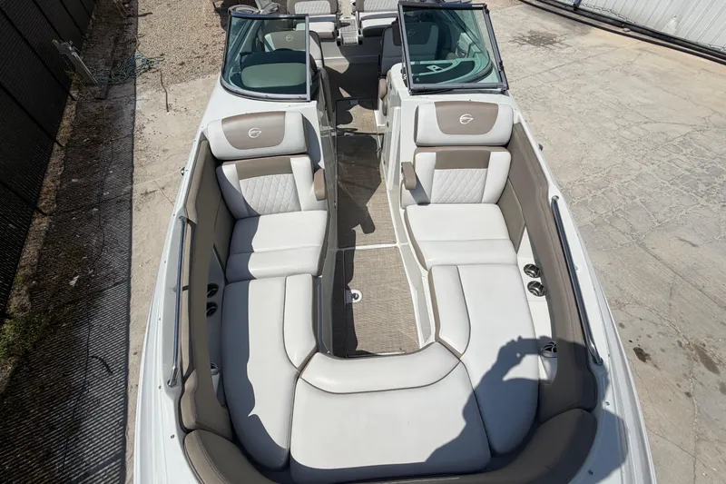 Slide: The Image of 2019 Crownline Eclipse E295 XS boat interior with spacious seating and modern design. - 30