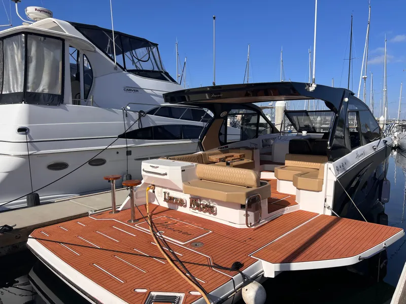 Slide: The Image of 2024 Hanover 387 motorboat on calm water. - 17