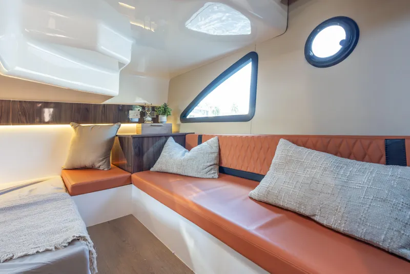 Slide: The Image of 2024 Hanover 387 interior with elegant leather seating. - 4