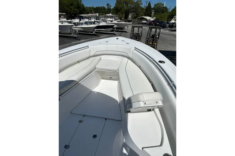 Slide: The Image of 2018 Sportsman Open 282 Center Console boat with spacious seating and sleek design. - 10