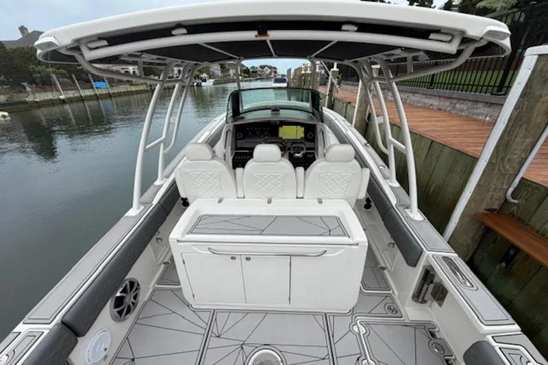 Slide: The Image of 2016 Chris-Craft Catalina 34 boat interior with modern seating and navigation equipment. - 3