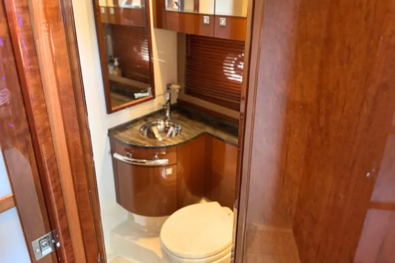 Slide: The Image of Luxurious bathroom interior of 2013 Sea Ray 450 Sundancer yacht with wood finishes. - 46
