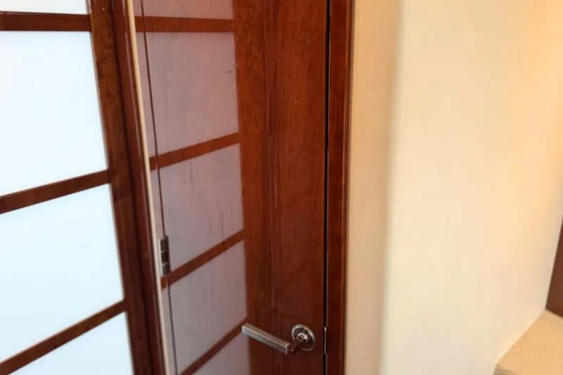 Slide: The Image of Wooden interior door on 2013 Sea Ray 450 Sundancer yacht. - 59