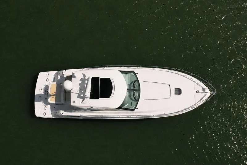 Slide: The Image of Overhead view of 2013 Sea Ray 450 Sundancer yacht on water. - 8