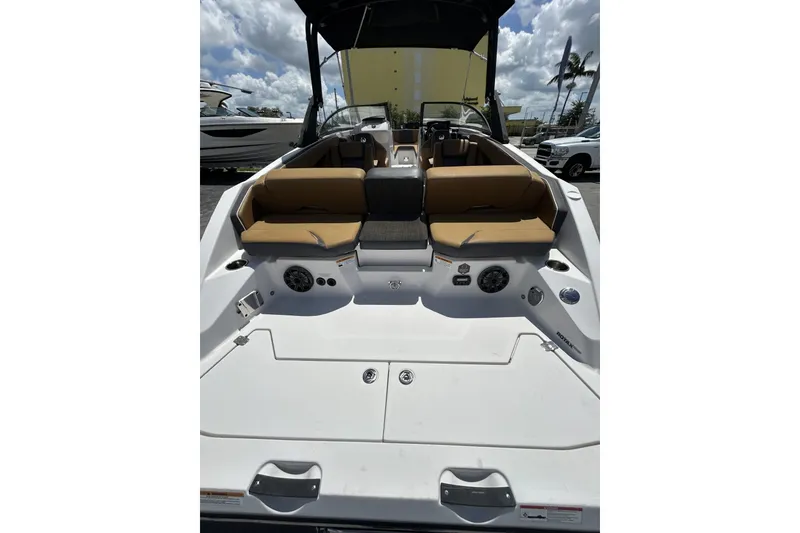 Slide: The Image of 2019 Scarab 255 ID boat interior with tan seating and modern design. - 20