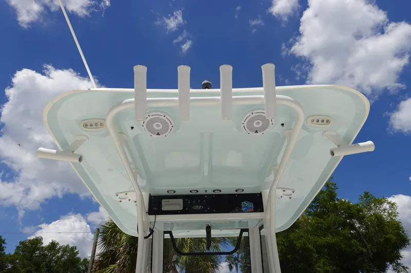 Slide: The Image of 2022 Sea Hunt Gamefish 27 Coffin Box boat top view against blue sky. - 14