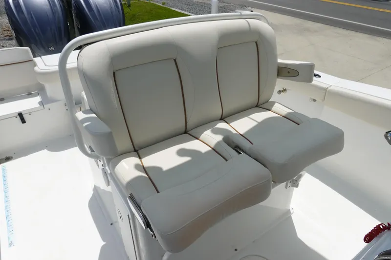 Slide: The Image of 2022 Sea Hunt Gamefish 27 Coffin Box boat seating area with dual cushioned seats. - 16