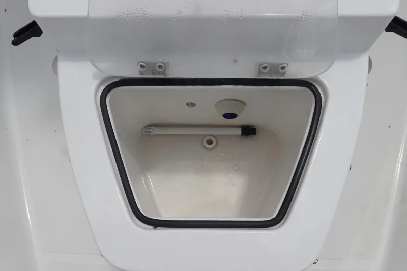 Slide: The Image of 2022 Sea Hunt Gamefish 27 Coffin Box interior, featuring a spacious storage compartment. - 30