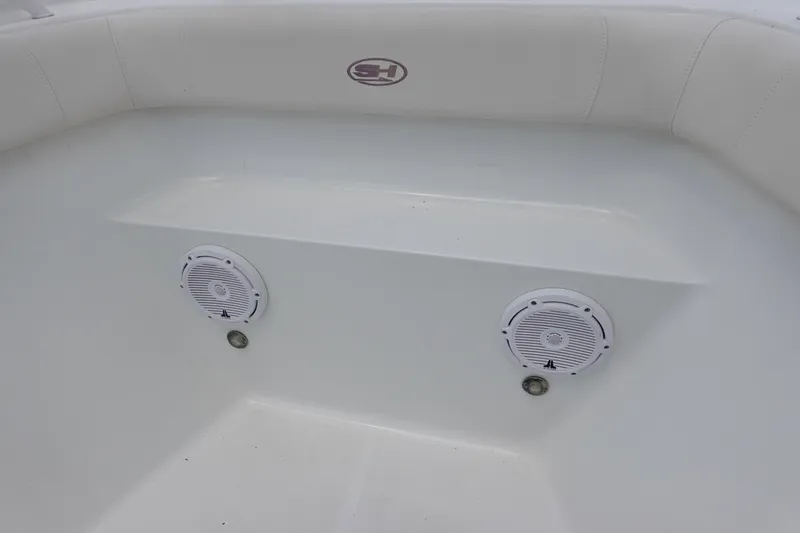 Slide: The Image of 2022 Sea Hunt Gamefish 27 Coffin Box interior with speakers and seating. - 31