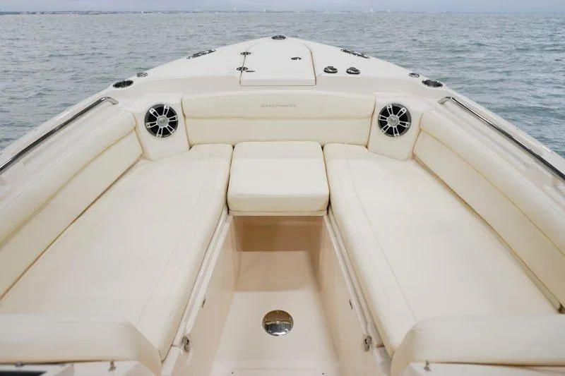 Slide: The Image of Luxurious seating on 2027 Grady-White Freedom 285 boat, overlooking serene ocean waters. - 11