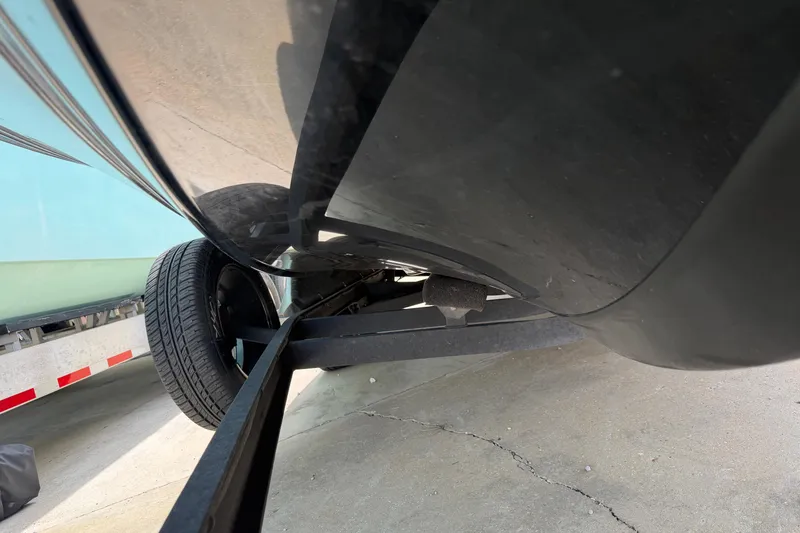 Slide: The Image of Underneath view of a 2022 Ranger Z520R Cup-Equipped boat on a trailer. - 100