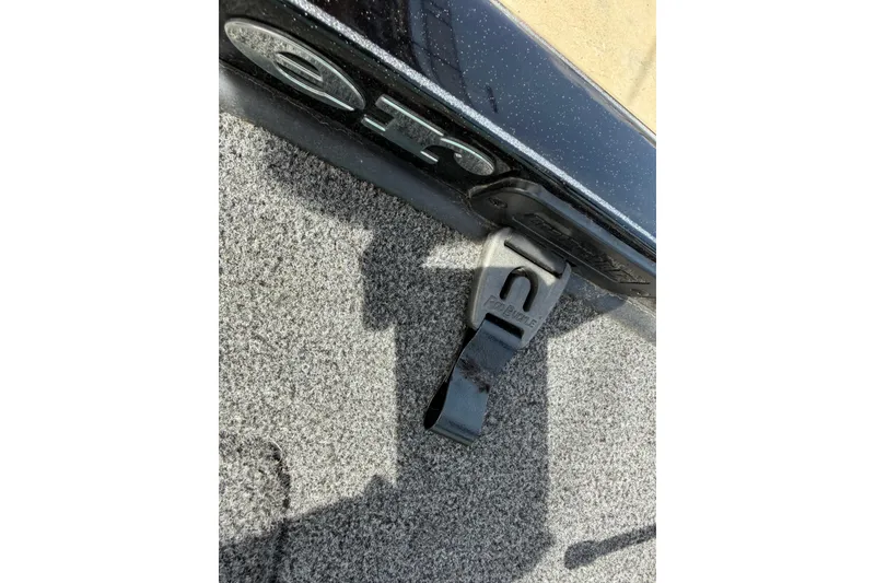 Slide: The Image of 2022 Ranger Z520R Cup-Equipped boat detail with Pro-Latch strap on carpeted surface. - 102