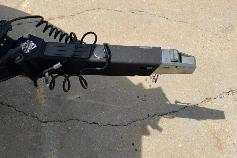 Slide: The Image of Trailer hitch of 2022 Ranger Z520R Cup-Equipped on concrete surface. - 107