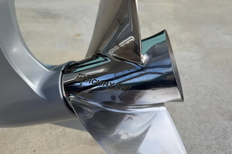 Slide: The Image of Close-up of a Mercury 23P propeller on a 2022 Ranger Z520R Cup-Equipped boat. - 113