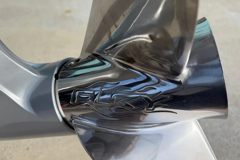 Slide: The Image of Close-up of a 2022 Ranger Z520R Cup-Equipped boat propeller with "Fury" engraving. - 114