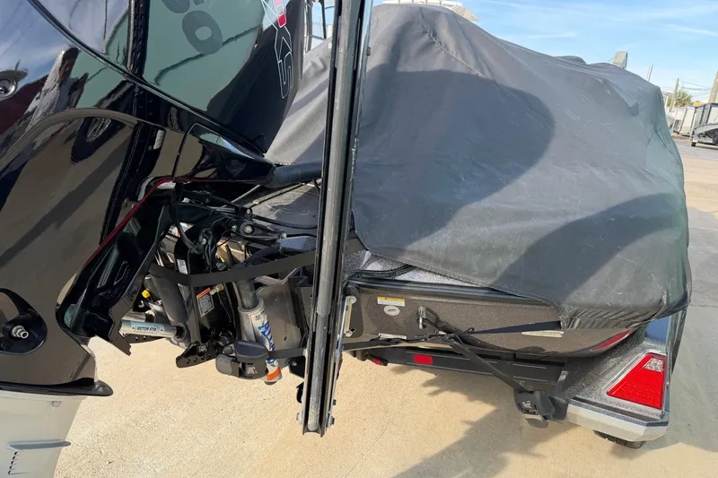 Slide: The Image of 2022 Ranger Z520R Cup-Equipped boat covered, showing motor and trailer details. - 117