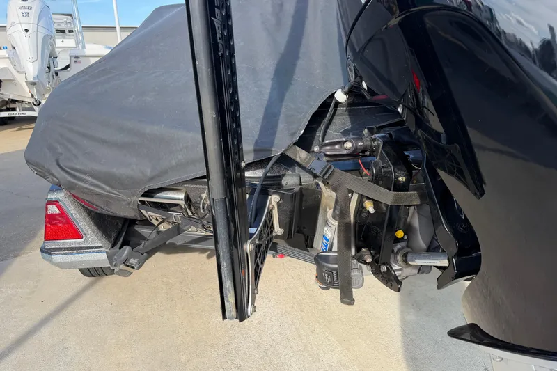 Slide: The Image of 2022 Ranger Z520R Cup-Equipped boat with cover, showing rear motor and trailer details. - 118