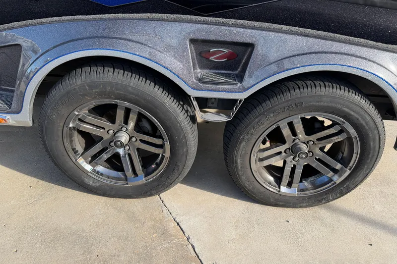 Slide: The Image of 2022 Ranger Z520R Cup-Equipped trailer wheels on concrete surface. - 121