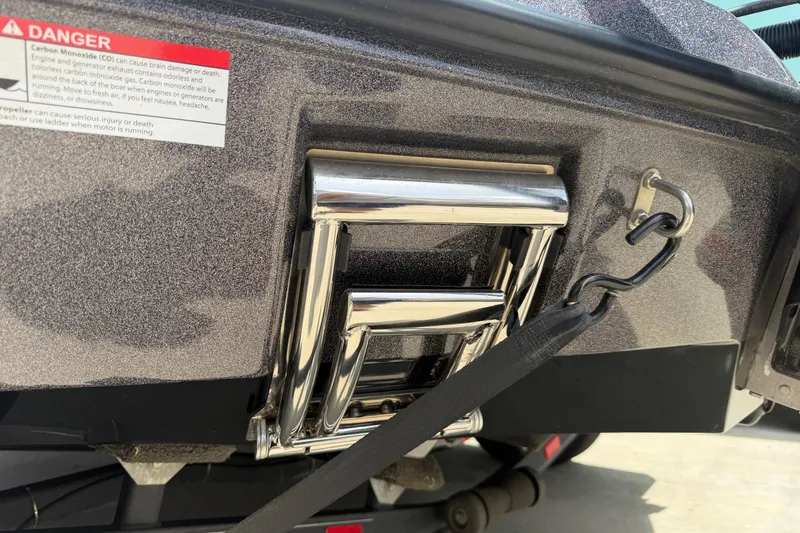 Slide: The Image of 2022 Ranger Z520R Cup-Equipped boat ladder with safety warning label. - 15