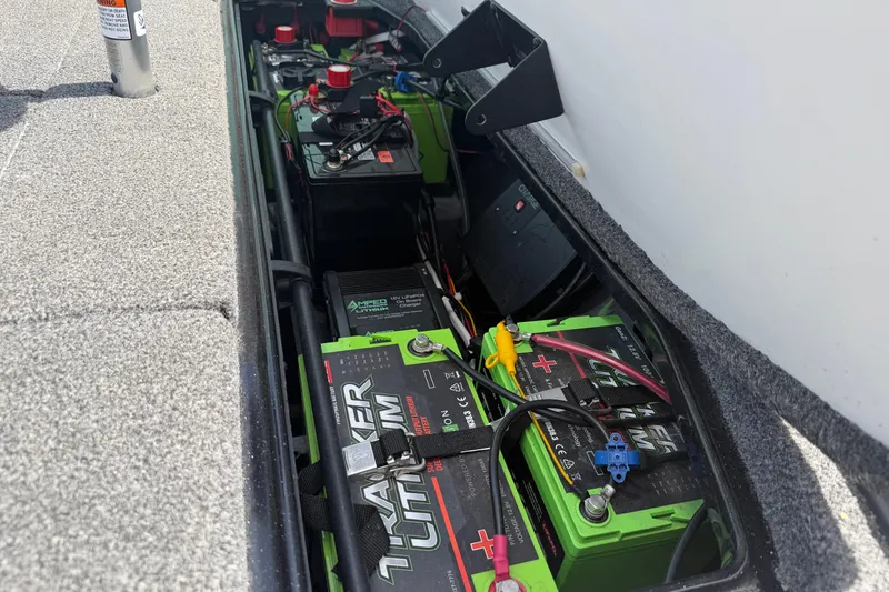 Slide: The Image of 2022 Ranger Z520R Cup-Equipped boat battery compartment with Tracker Lithium batteries. - 18