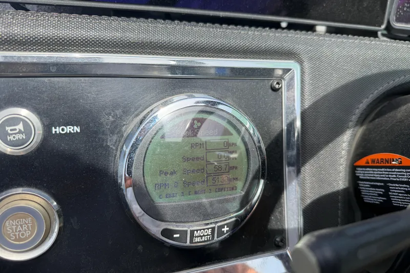 Slide: The Image of Dashboard of 2022 Ranger Z520R Cup-Equipped boat showing speed and RPM display. - 29