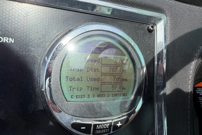 Slide: The Image of Dashboard display of a 2022 Ranger Z520R Cup-Equipped showing trip data and fuel usage. - 30