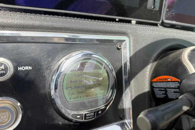 Slide: The Image of Dashboard of 2022 Ranger Z520R Cup-Equipped boat with digital display and controls. - 32