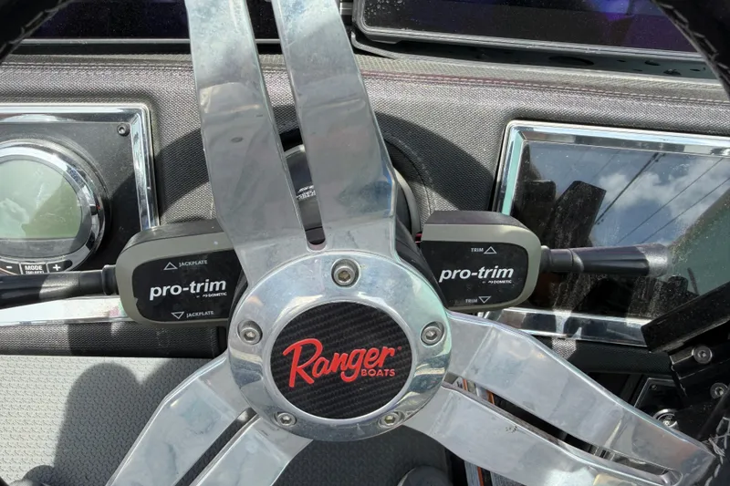 Slide: The Image of Steering wheel of 2022 Ranger Z520R Cup-Equipped boat with Pro-Trim controls. - 34