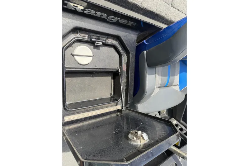 Slide: The Image of 2022 Ranger Z520R Cup-Equipped boat interior with storage compartment and seating. - 38