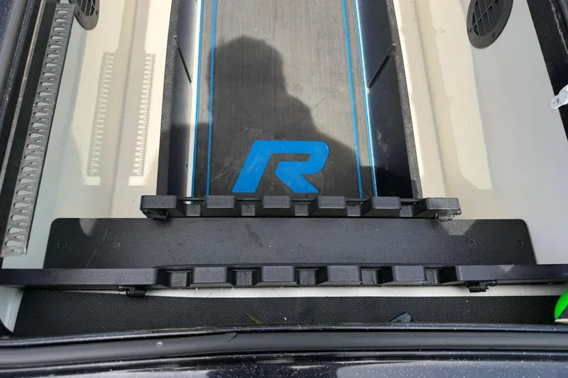 Slide: The Image of 2022 Ranger Z520R Cup-Equipped boat interior with logo and storage compartments. - 45