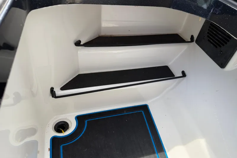 Slide: The Image of Interior view of 2022 Ranger Z520R Cup-Equipped boat steps and flooring. - 49