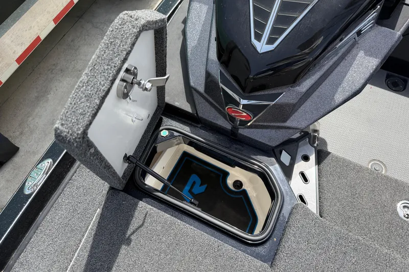 Slide: The Image of 2022 Ranger Z520R Cup-Equipped boat storage compartment with open lid and sleek design. - 60