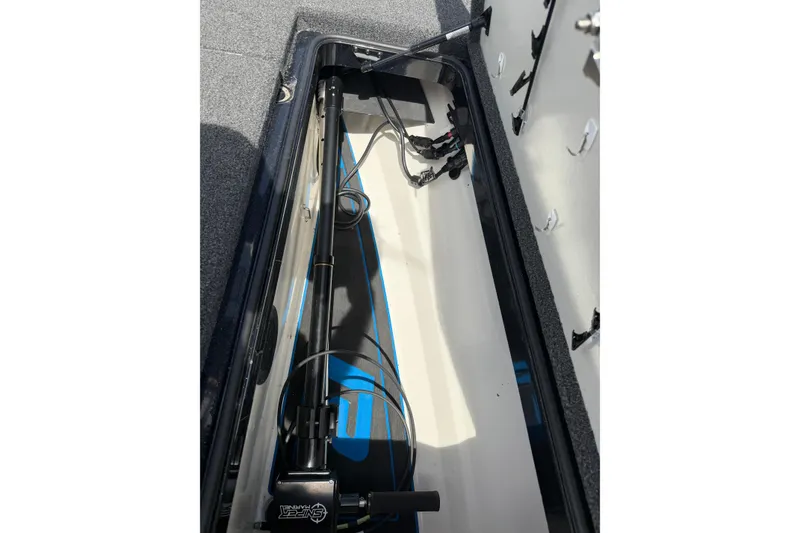Slide: The Image of 2022 Ranger Z520R Cup-Equipped boat storage compartment with fishing rod holders. - 62