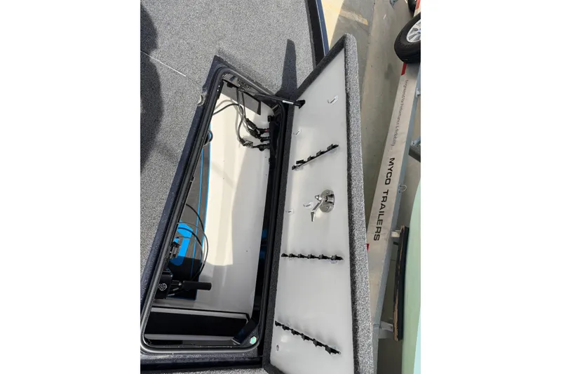 Slide: The Image of Open storage compartment of 2022 Ranger Z520R Cup-Equipped boat, showing interior details. - 63
