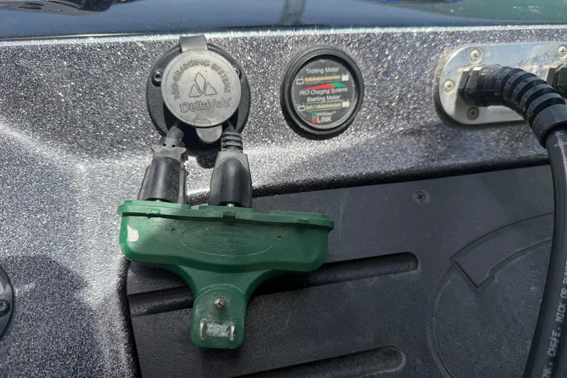 Slide: The Image of 2022 Ranger Z520R Cup-Equipped boat dashboard with DeltaVolt charging system and connectors. - 7