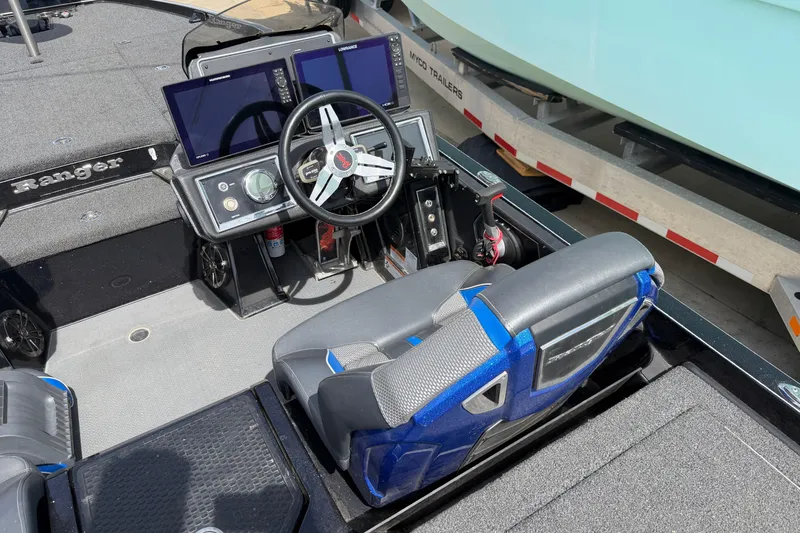 Slide: The Image of 2022 Ranger Z520R Cup-Equipped boat cockpit with dual screens and steering wheel. - 71