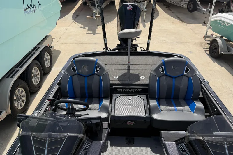Slide: The Image of 2022 Ranger Z520R Cup-Equipped boat interior with dual seats and steering wheel. - 77