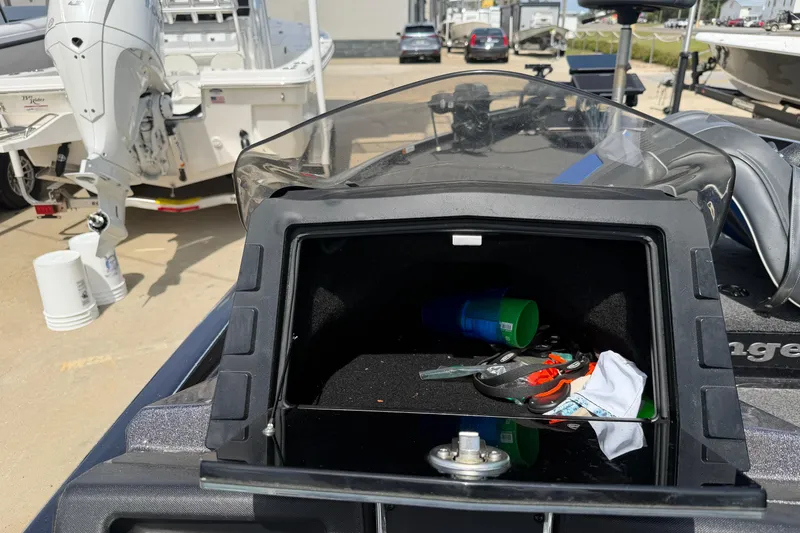Slide: The Image of 2022 Ranger Z520R Cup-Equipped boat storage compartment with accessories and tools. - 78