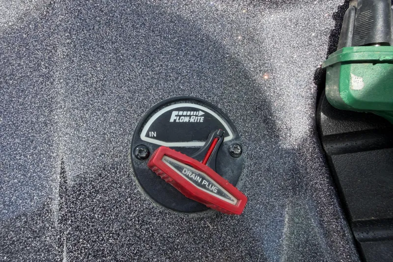 Slide: The Image of Flow-Rite drain plug on 2022 Ranger Z520R Cup-Equipped boat, close-up view. - 8