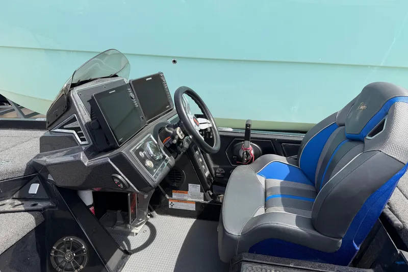 Slide: The Image of 2022 Ranger Z520R Cup-Equipped boat interior with advanced dashboard and comfortable seating. - 82