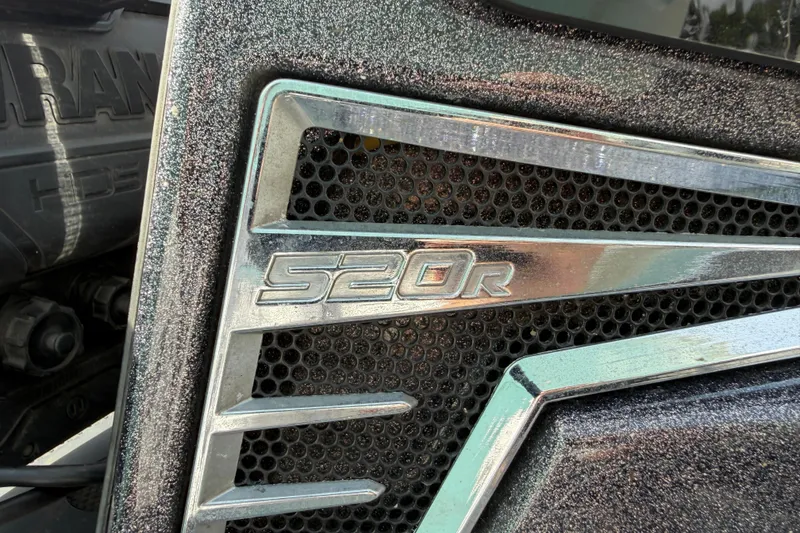 Slide: The Image of Close-up of 2022 Ranger Z520R Cup-Equipped badge with metallic finish and textured background. - 9