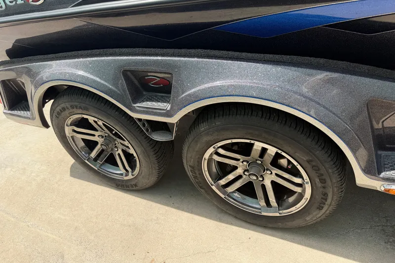 Slide: The Image of 2022 Ranger Z520R Cup-Equipped trailer with dual Load Star tires and sleek metallic finish. - 93