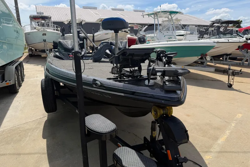 Slide: The Image of 2022 Ranger Z520R Cup-Equipped boat on trailer, surrounded by other boats. - 97