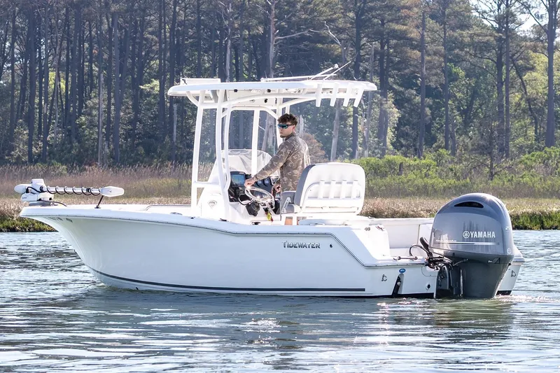 The Image of 2021 Tidewater 220 LXF boat on calm water with Yamaha engine. - 0