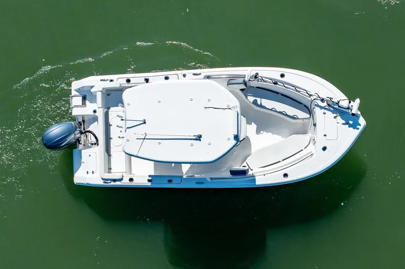 Slide: The Image of Overhead view of 2021 Tidewater 220 LXF boat on green water. - 5