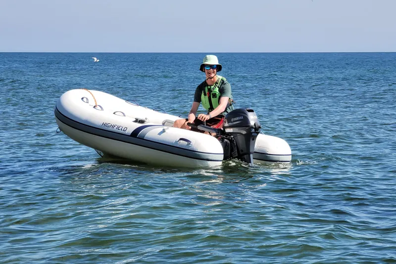Slide: The Image of Man on 2026 Highfield UltraLite 290 inflatable boat in open water. - 6
